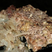 Voir la recette, Escalopes de porc au four sur lit d'oignons